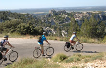 cycling in Van gogh landscape to st remy and les baux perched medieval village in the olives groves